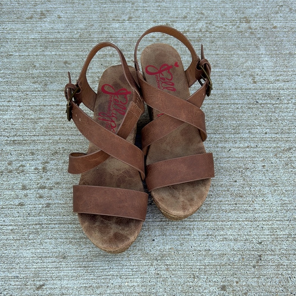 Jelly pop wedges with brown straps.